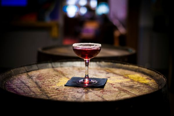 Martini in a dimly lit speakeasy bar