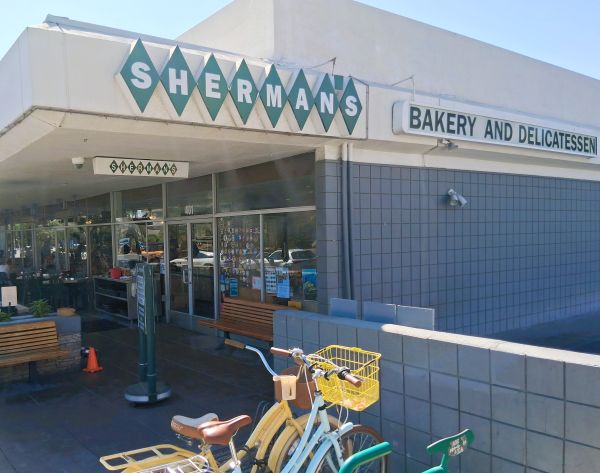 The front entrance and signage at Shermans Deli in Palm Springs