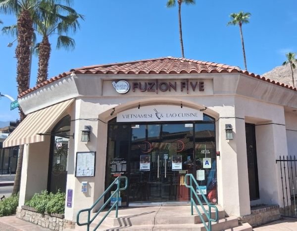 Exterior of Fuzion Five restaurant in downtown Palm Springs, featuring signage for Vietnamese & Lao cuisine.