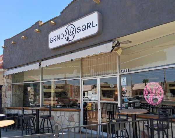Front entrance and signage for Grnd Sqrl Gastropub in 29 Palms