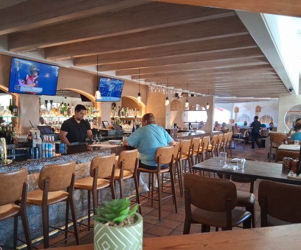 The bar area sits just past the front entrance of The Hideout in Palm Desert