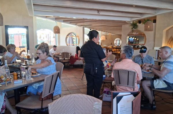 A busy dining room at The Hideout in Palm Desert