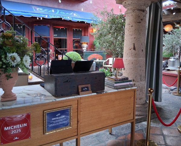 Host stand and entrance area at Beaton's with the Michelin Guide plaque displayed outside Bar Cecil.