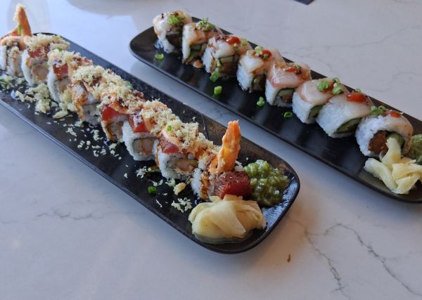 El Paseo Roll and Palm Crunch Roll served at Yozu Asian Bistro in Palm Desert featuring spicy tuna, amberjack, shrimp tempura, seared ahi, blue crab, avocado, and house garnishes.