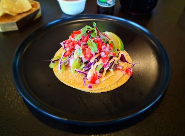 The Octopus Pulpo Taco is one of the standout menu items at Delicias